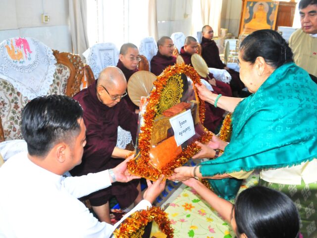 Offering of Wazo Yellow Robe and lunch to venerable monks and novices to mark HTOO Group of Companies Chairman U Tay Za’s 54th birthday.rinanda